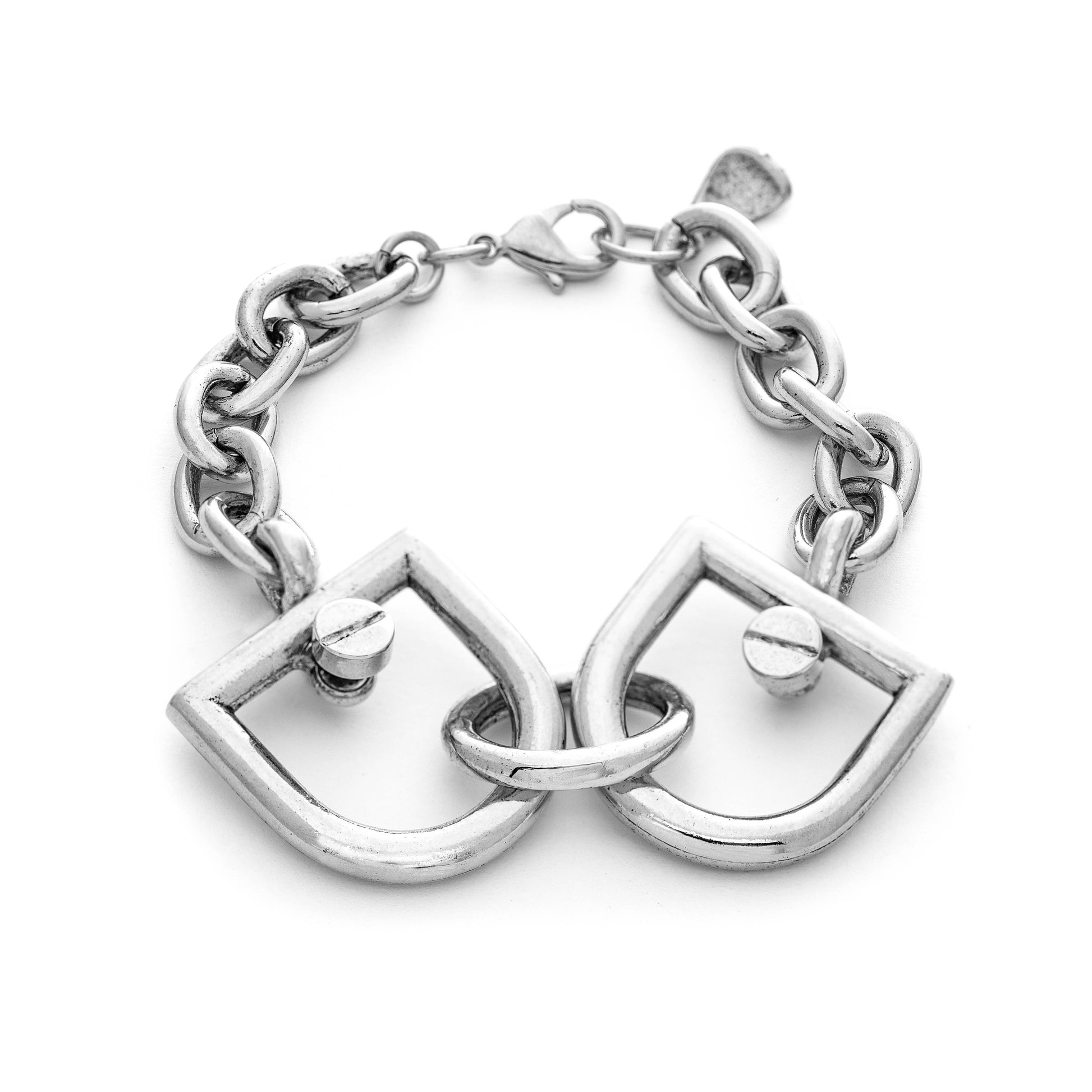 A silver-plated interlocked bracelet with a heart-shaped design, handcrafted in New York.