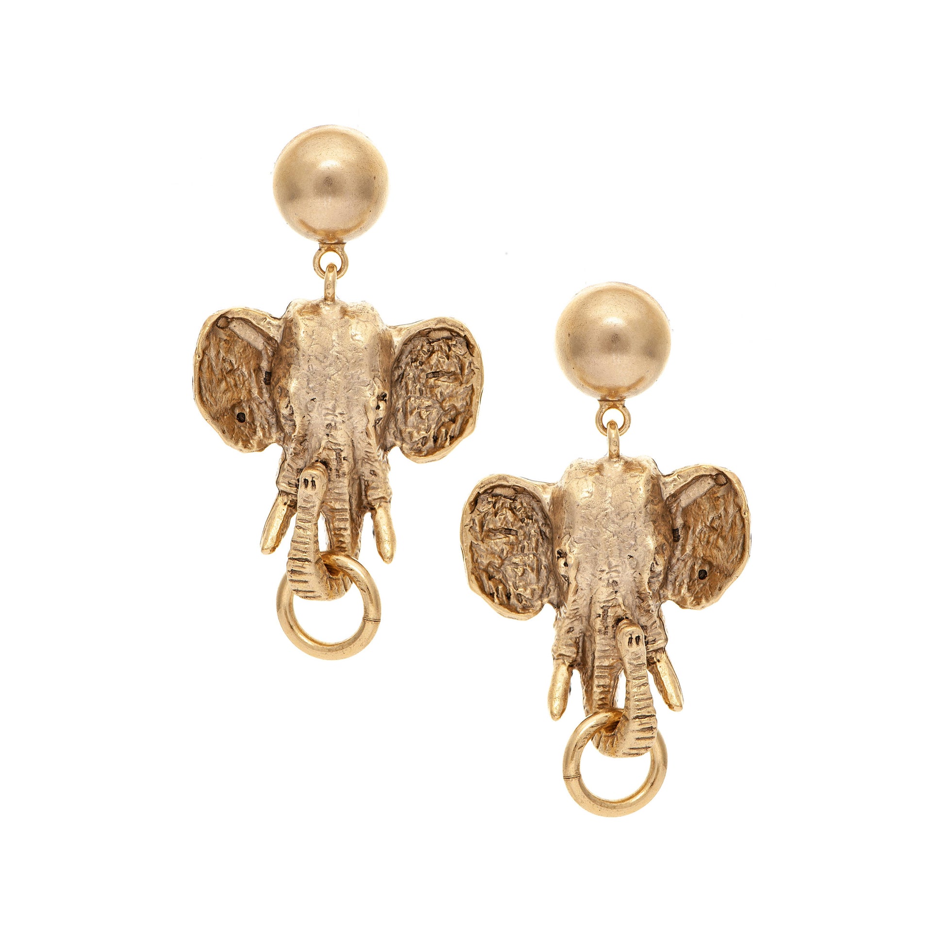 A pair of gold-colored elephant-shaped earrings against a white background