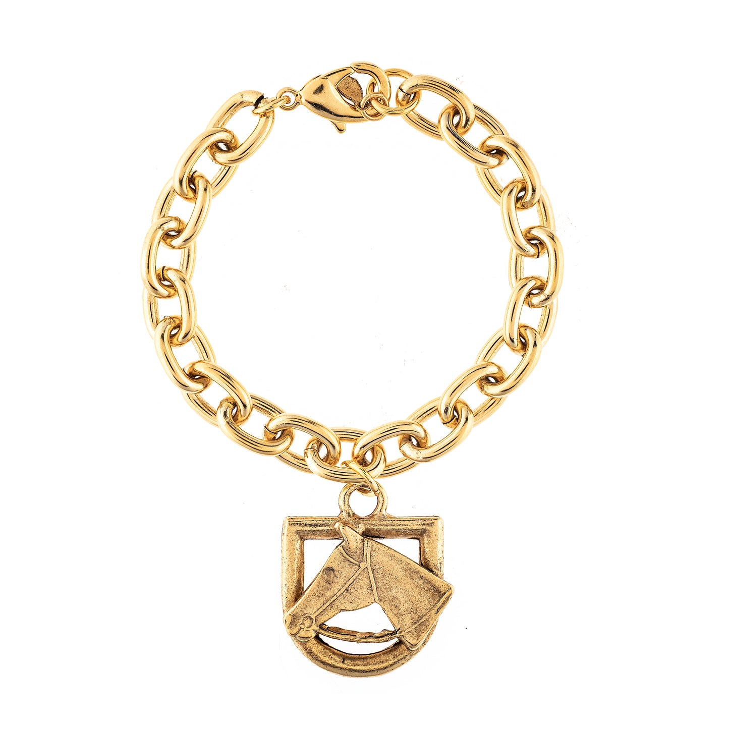 Gold chain bracelet with a shield-shaped pendant on a white background