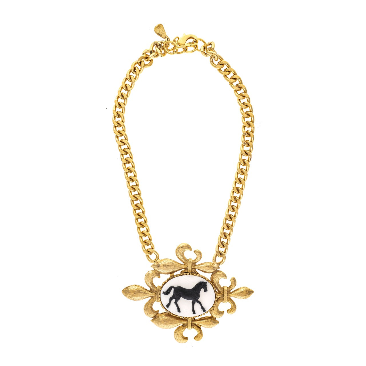 Gold chain necklace with a black and white pendant featuring a horse on a white background