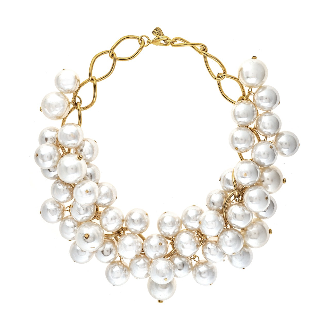 Gold necklace with white pearls on a white background