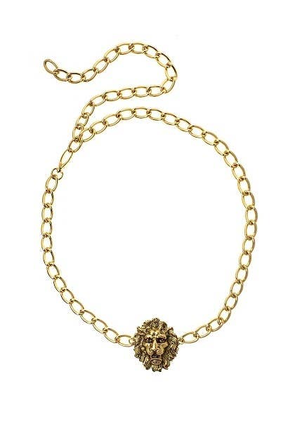 A gold-colored belt with an embellished lion face design, featuring a chain strap and a buckle.