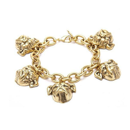 A gold-colored bracelet with a chain design and multiple bulldog charms attached.