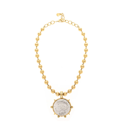 A gold-plated necklace featuring a Roman coin pendant on a ball chain.