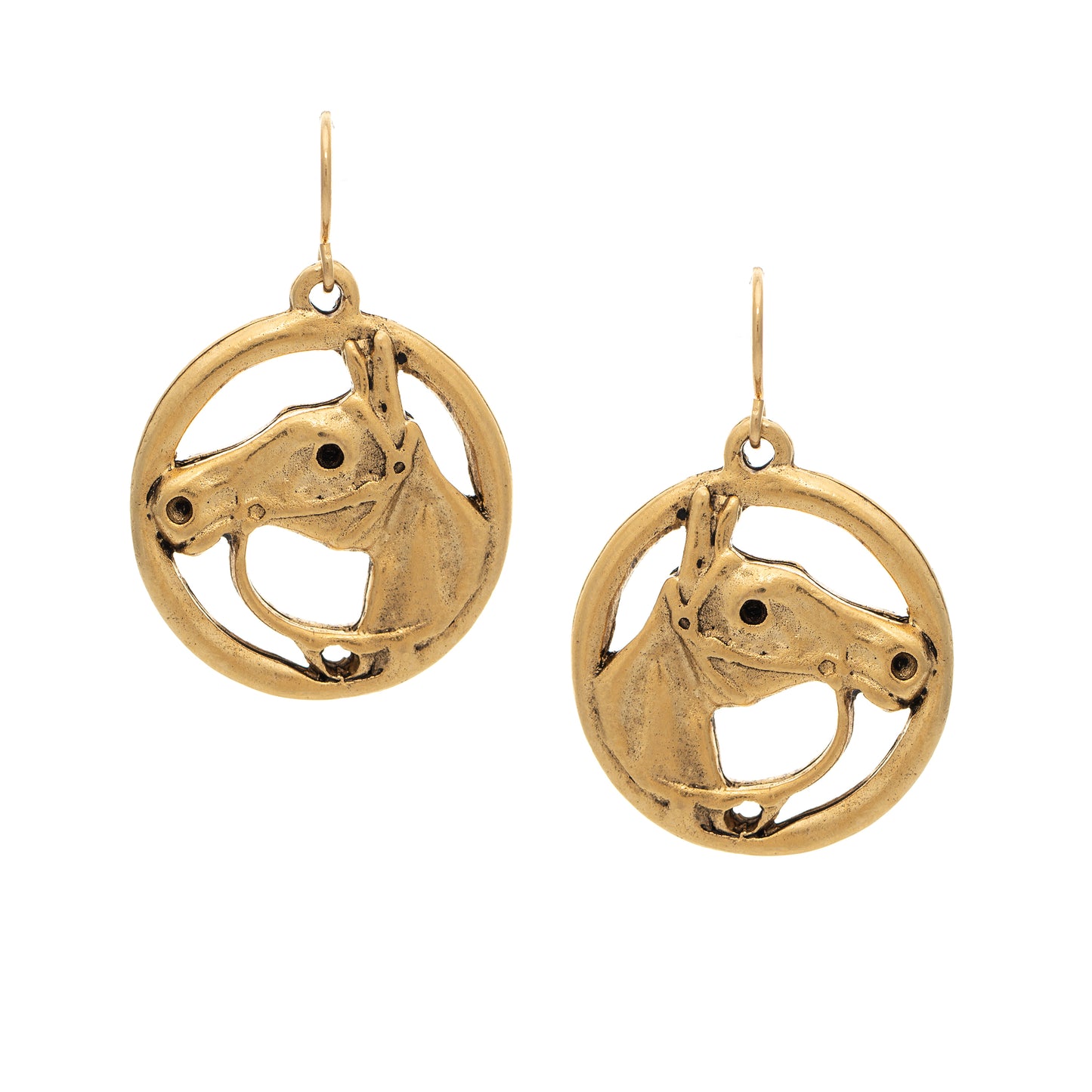 Gold horse head earrings on a white background