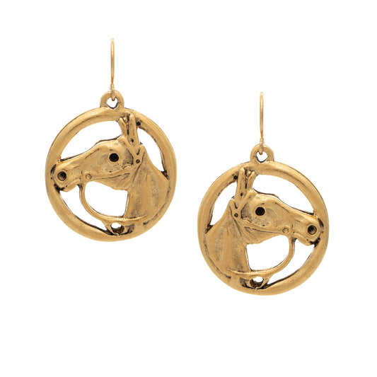 Gold horse head earrings on a white background