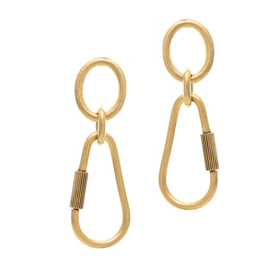Pair of gold earrings on a white background