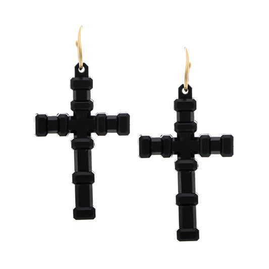 Black cross-shaped earrings on a white background