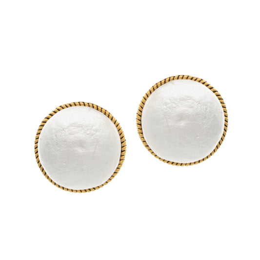 Pair of round earrings with gold rims on a white background