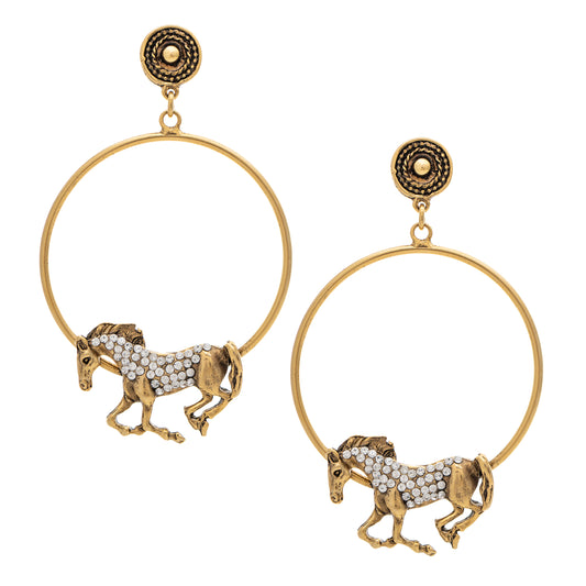 Gold hoop earrings with horse designs on a white background