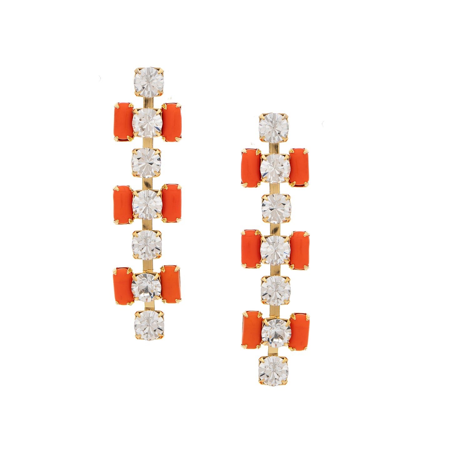 Pair of earrings with orange and clear gemstones on a white background