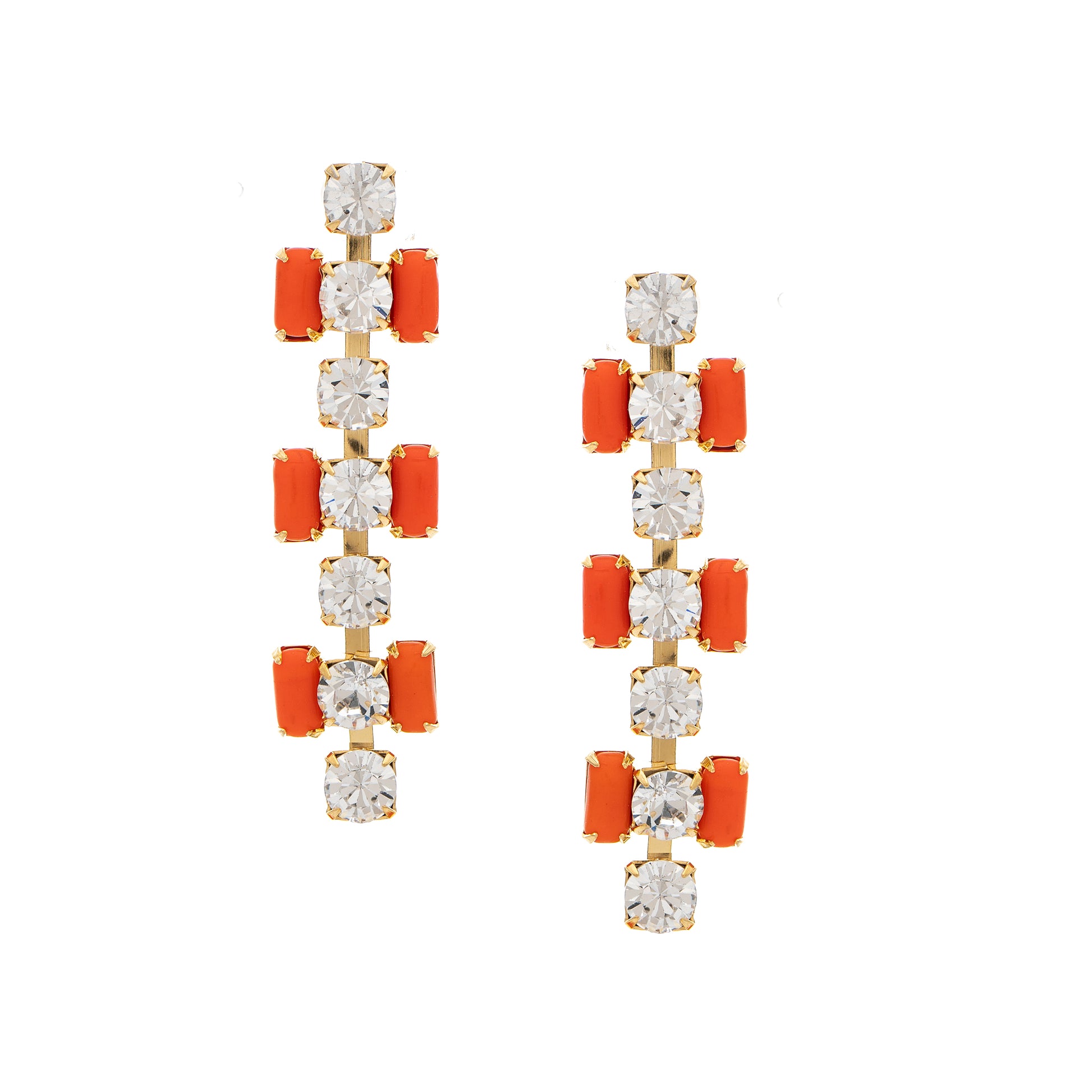 Pair of earrings with orange and clear gemstones on a white background