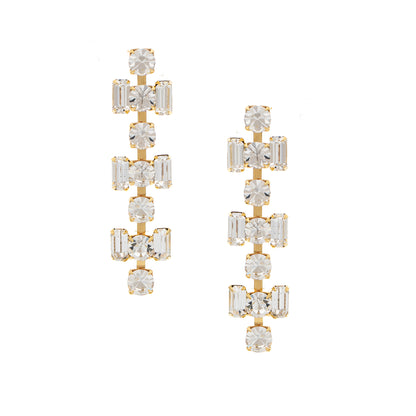 Gold and crystal drop earrings on a white background