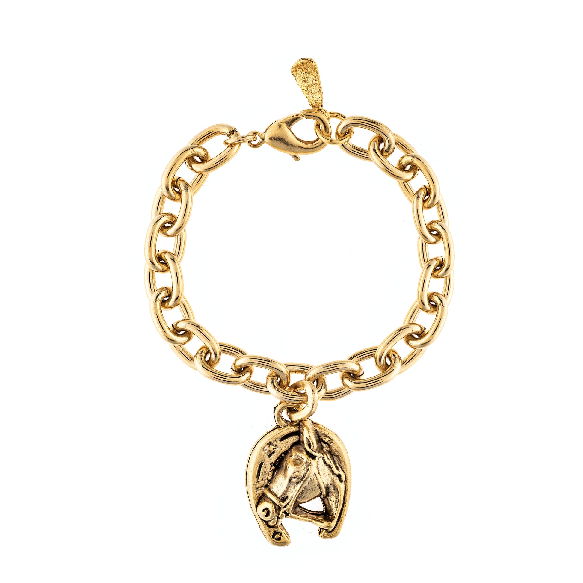 Gold chain bracelet with a horse head charm on a white background