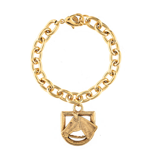 Gold chain bracelet with a shield-shaped pendant on a white background