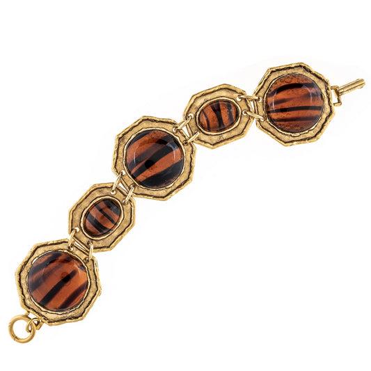 Bracelet with gold and tiger eye stone design on a white background