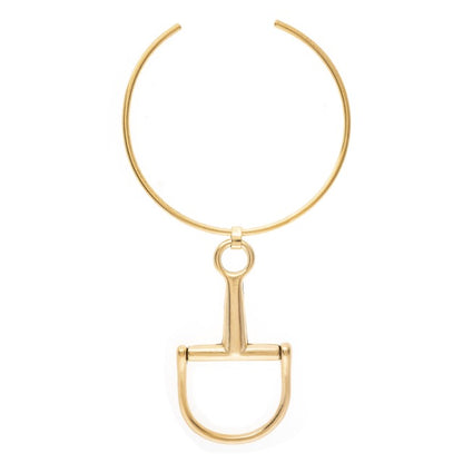 Gold equestrian bit necklace on a white background