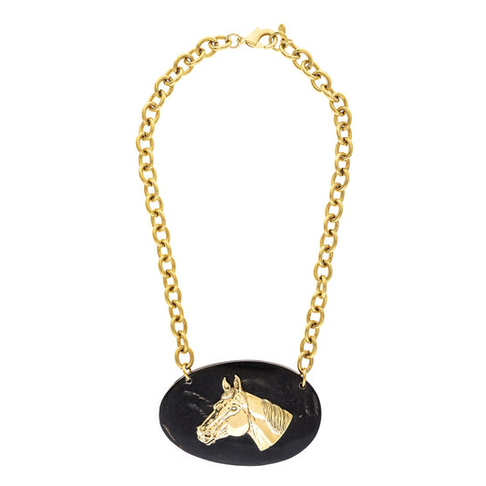 Gold necklace with a horse head pendant on a white background