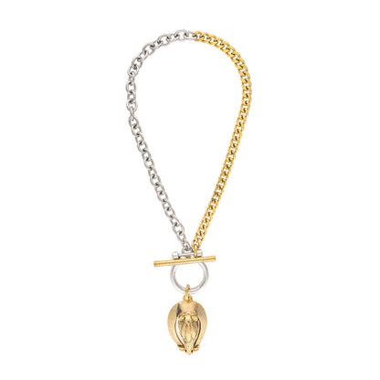 Two-tone necklace with a pendant on a white background