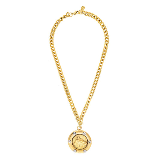 Gold necklace with a pendant on a white background