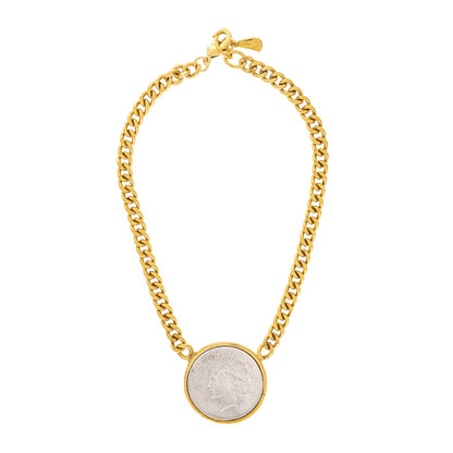 Gold chain bracelet with a coin charm on a white background