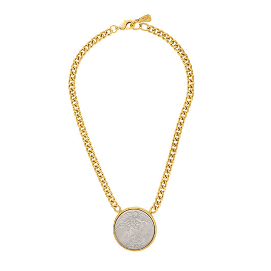 Gold chain necklace with a round pendant on a white background