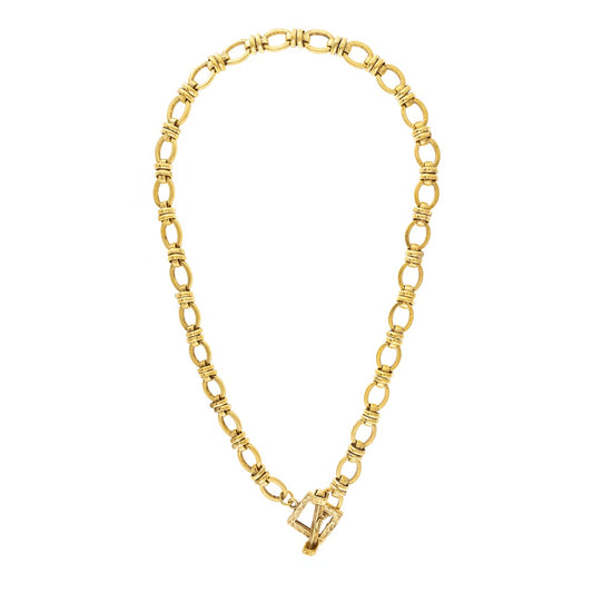 Gold chain necklace on a white background