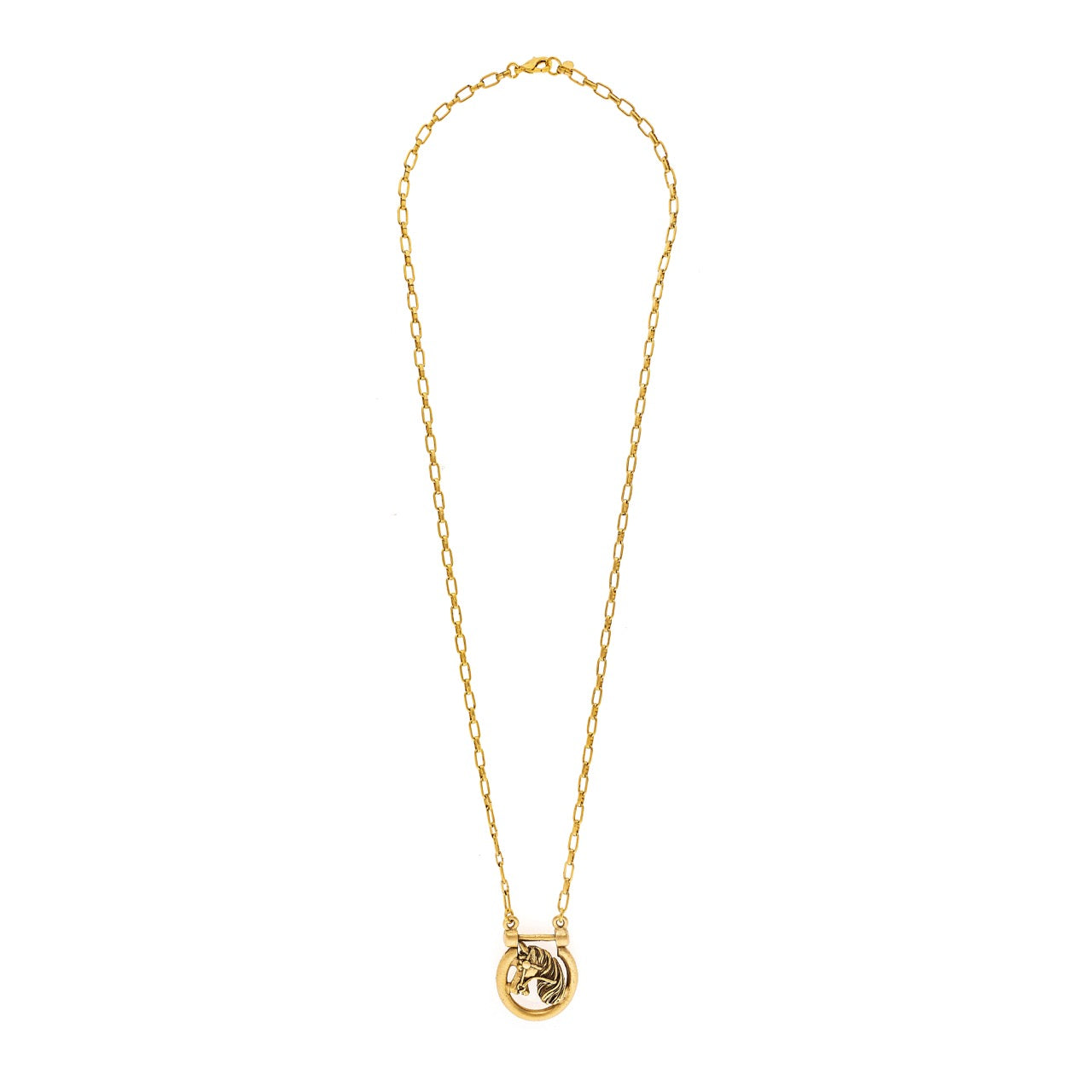 Gold necklace with a small pendant on a white background