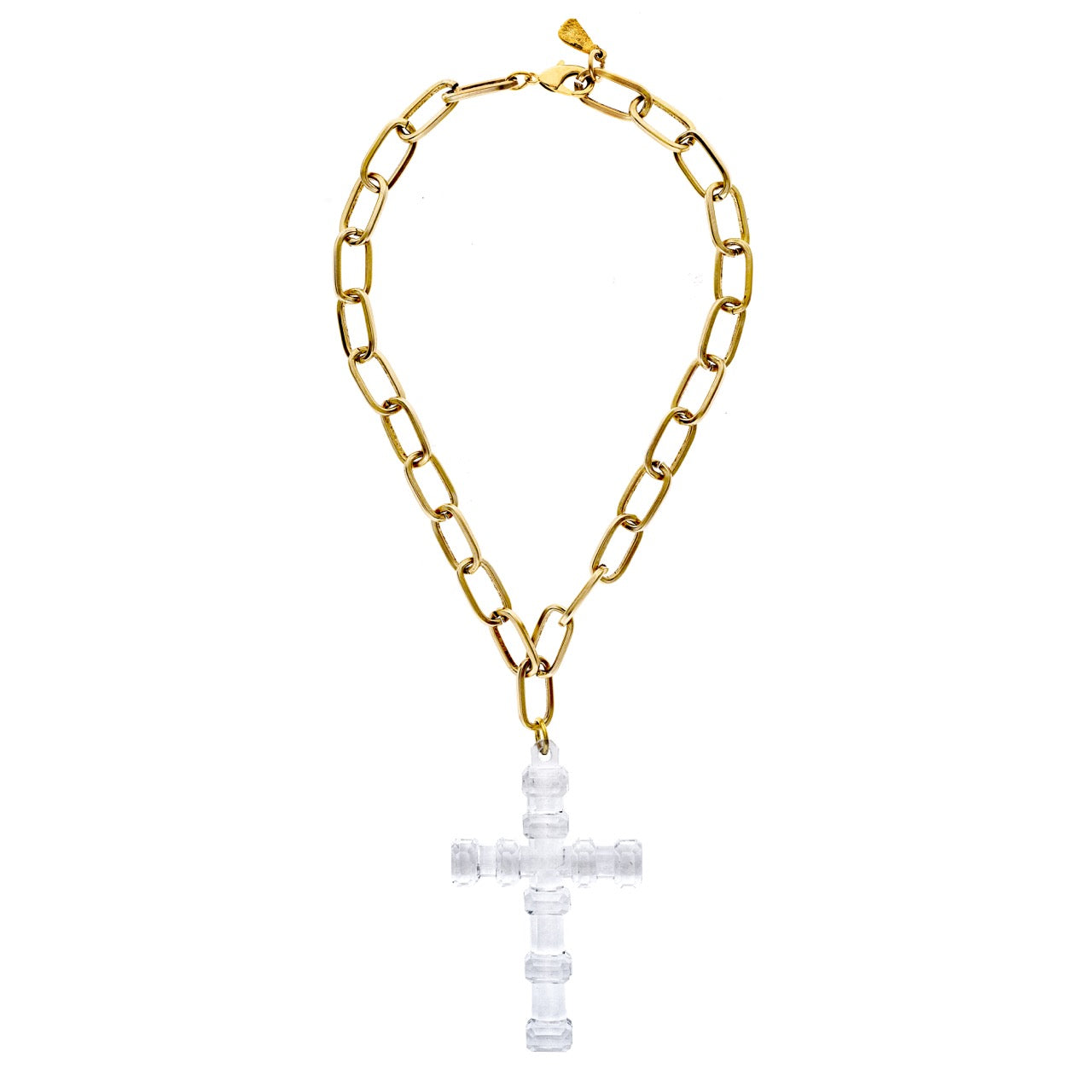 Gold chain necklace with a clear cross pendant on a white background