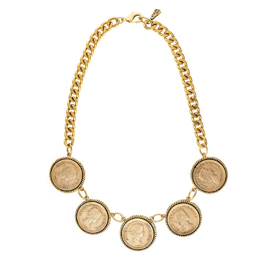 Gold chain necklace with coin pendants on a white background