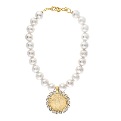 Pearl necklace with a gold coin pendant on a white background