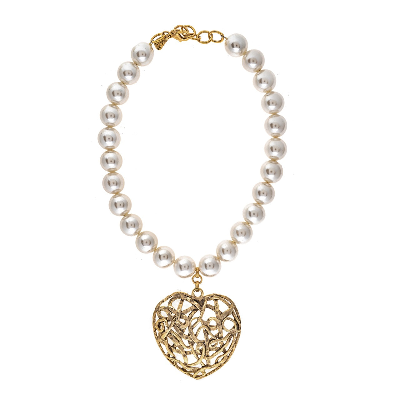 Pearl necklace with a gold heart pendant on a white background