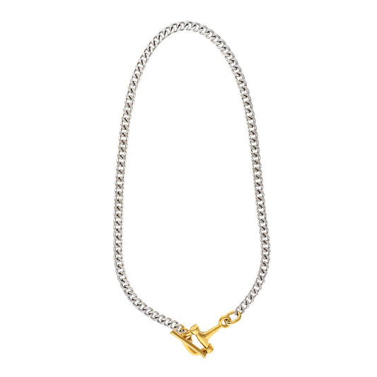 Silver chain necklace with a gold clasp on a white background