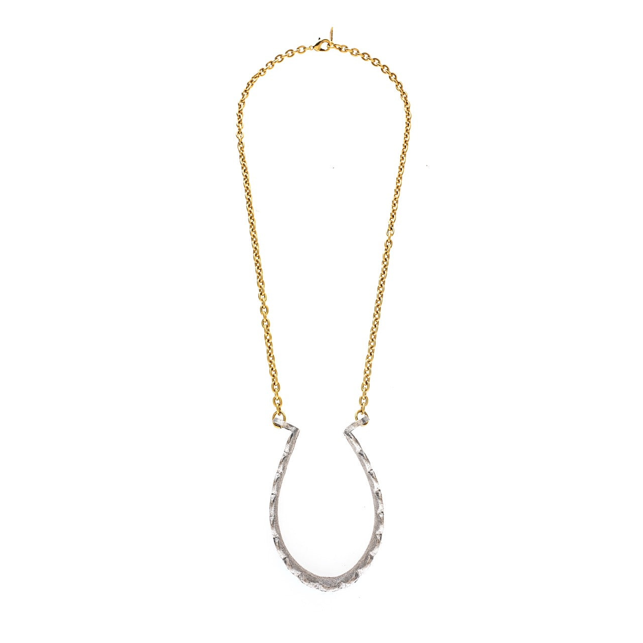 Gold necklace with a unique pendant on a white background