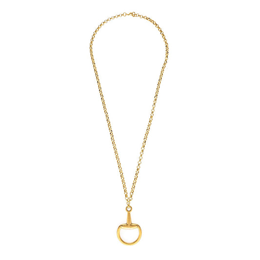 Gold necklace with a unique pendant on a white background