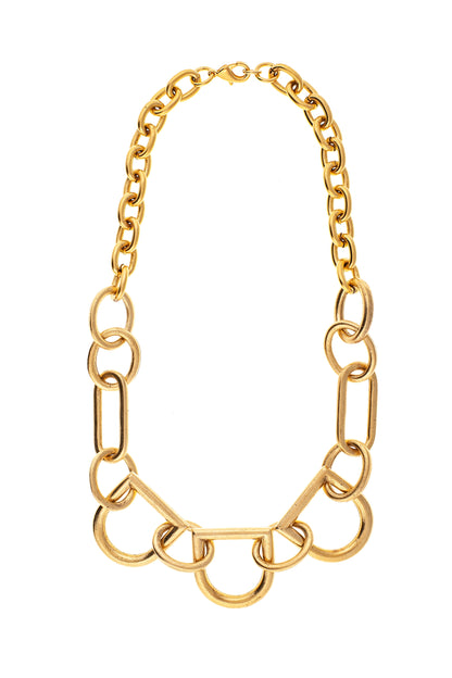 A gold-colored interlocked D-shaped necklace